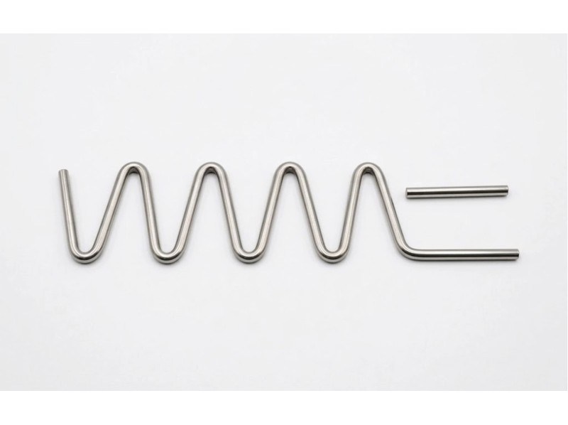 Refractory wavy anchor with ceramic cap